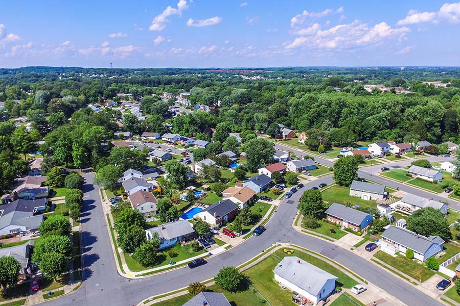 Sayre, PA - Aerial View of a Neighborhood in Parkville, Maryland Displaying Many Homes and Trees on a Sunny Day